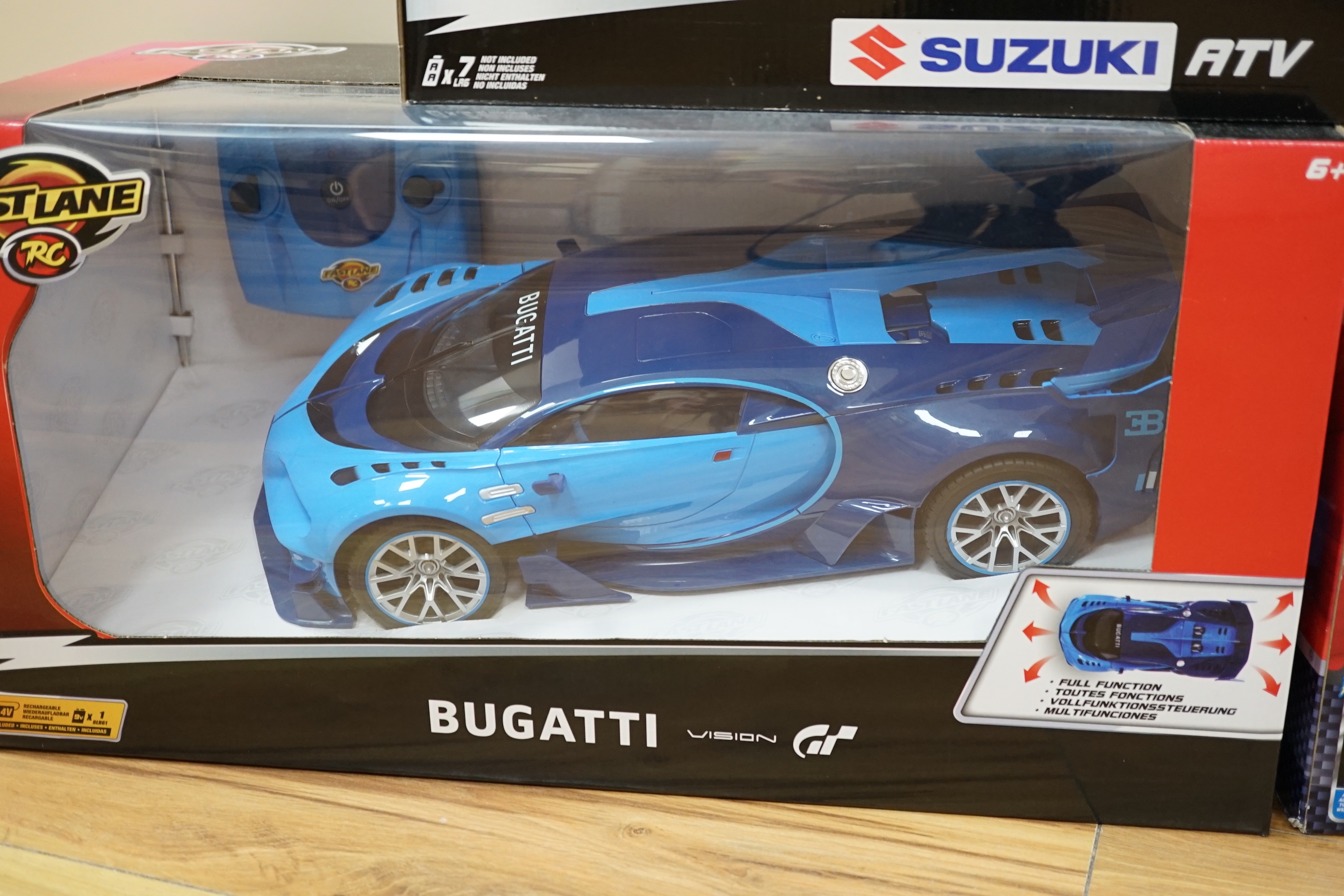 Three boxed FastLane RC cars